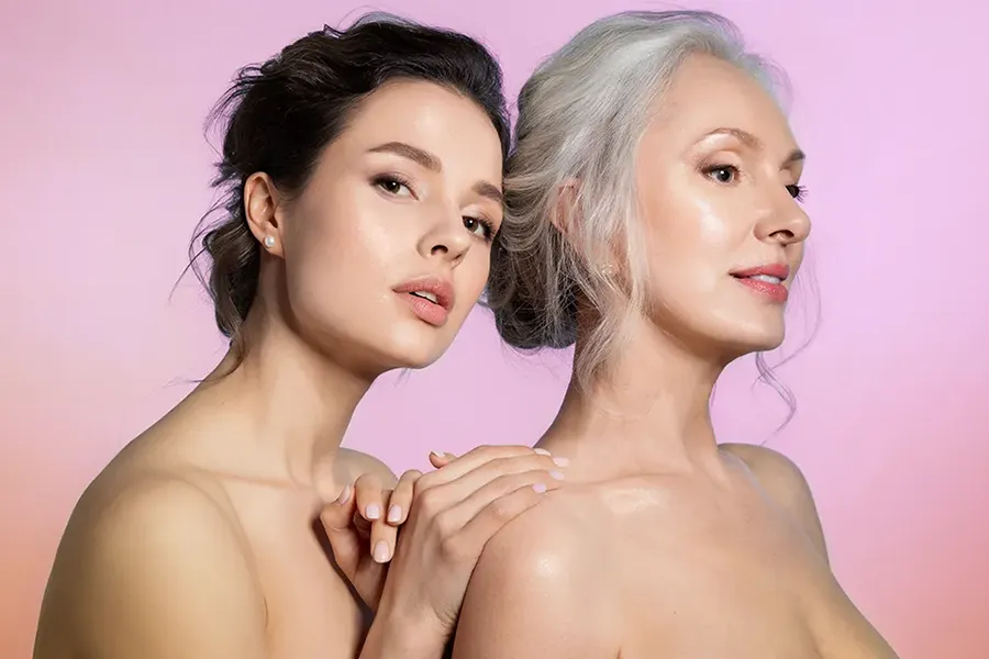 Aesthetic-Clinic An older and younger woman, both beautiful. Get aesthetic and cosmetic treatments from Scott Gulinson, MD, FACOG in Phoenix.